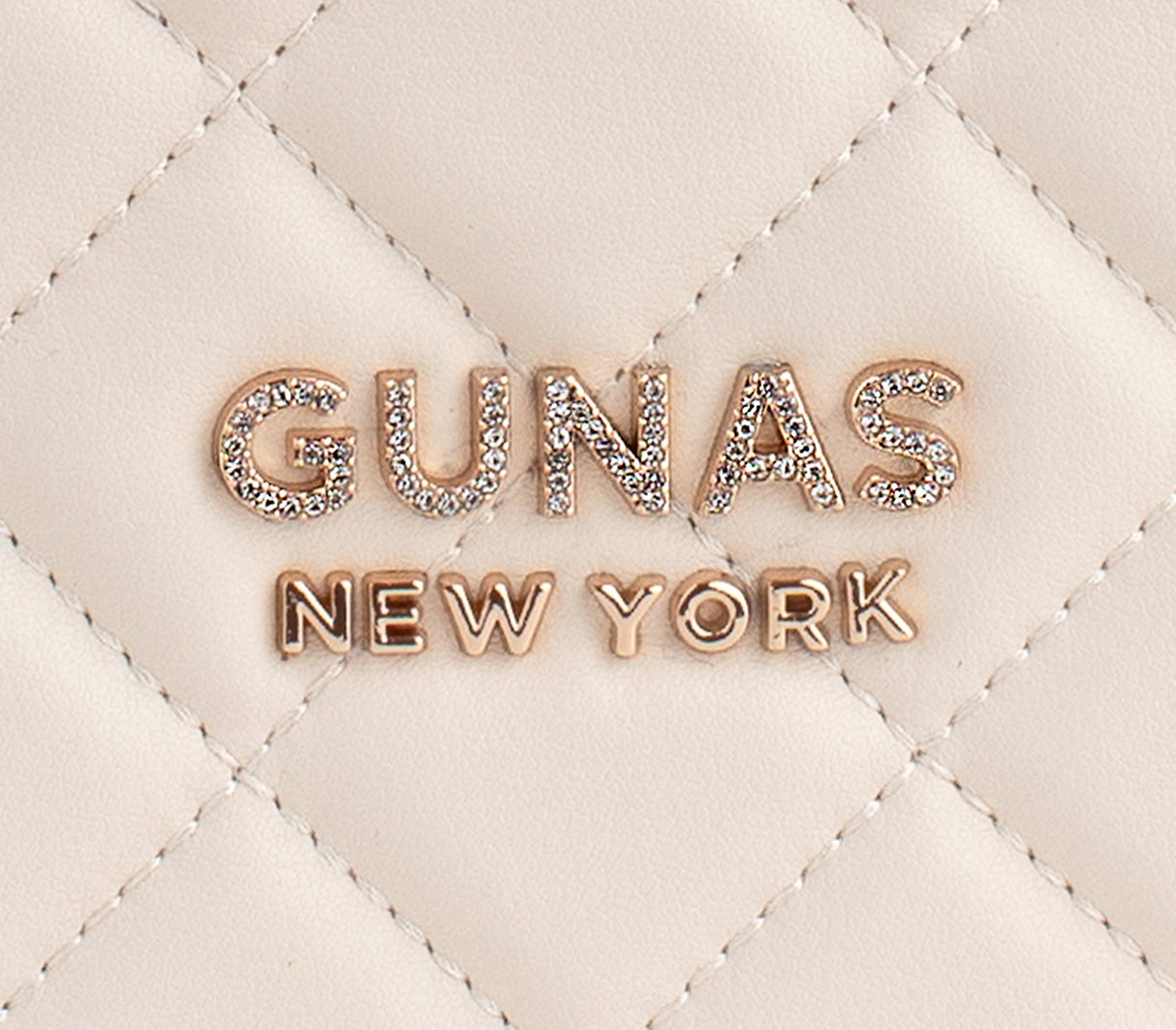 Koi - Off-white Quilted Vegan Leather Purse from Gunas New York