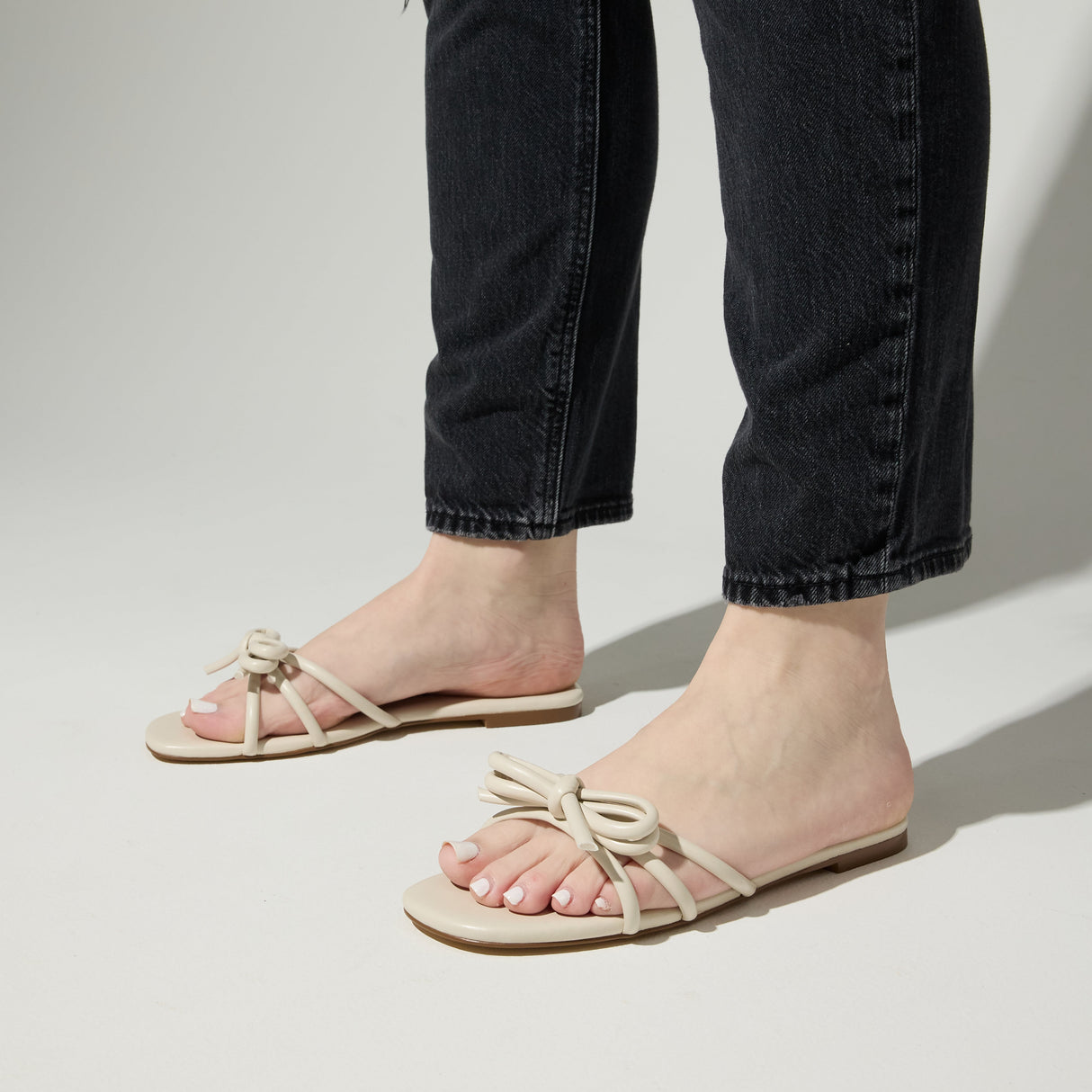 Nicole Bow Slide Sandal in Bone from Yosi Samra