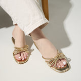 Nicole Bow Slide Sandal in Gold from Yosi Samra