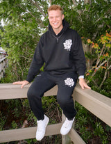Our World Needs Jesus Black Unisex Sweatpant from Elevated Faith