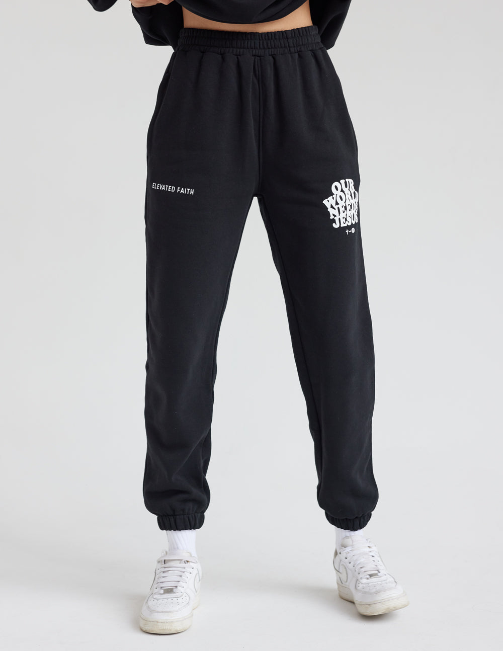 Our World Needs Jesus Black Unisex Sweatpant from Elevated Faith