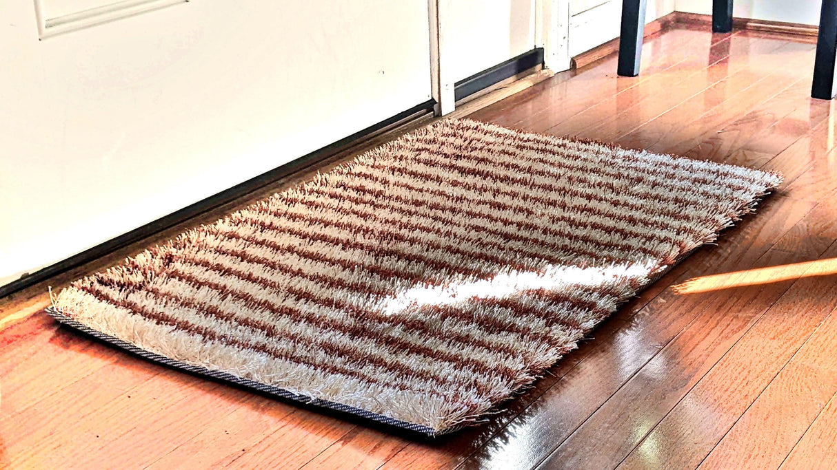 DaDa Bedding Shaggy Soft Door Mat Carpet Rug - 20" x 32" Striped Shiny Coffee Light Beige / Dark Brown from DaDalogy Bedding Collection