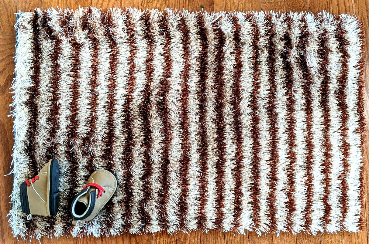 DaDa Bedding Shaggy Soft Door Mat Carpet Rug - 20" x 32" Striped Shiny Coffee Light Beige / Dark Brown from DaDalogy Bedding Collection