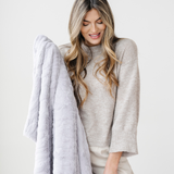PATTERNED FAUX FUR THROW BLANKETS From Saranoni