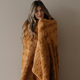 PATTERNED FAUX FUR THROW BLANKETS From Saranoni