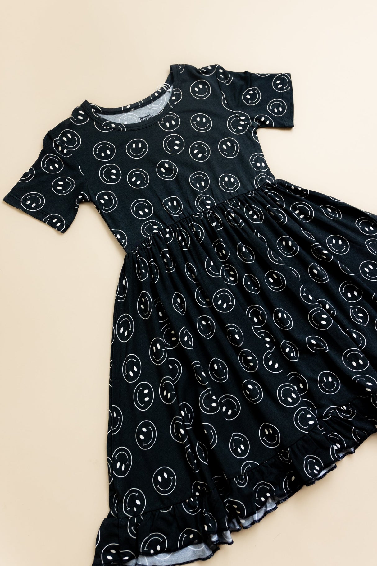 MIDNIGHT SMILES DREAM RUFFLE DRESS from DREAM BIG LITTLE CO
