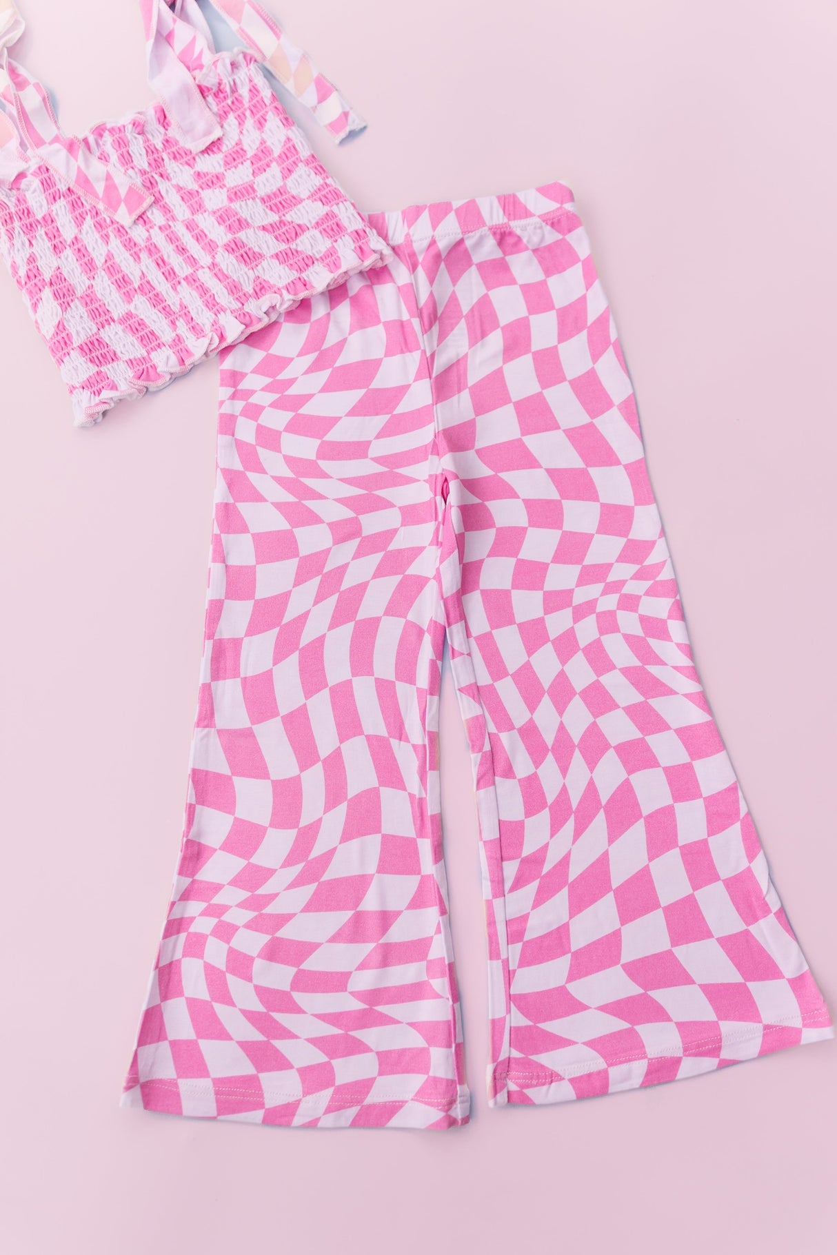 BUBBLEGUM WAVY CHECKERS DREAM SMOCKED FLARE SET from DREAM BIG LITTLE CO