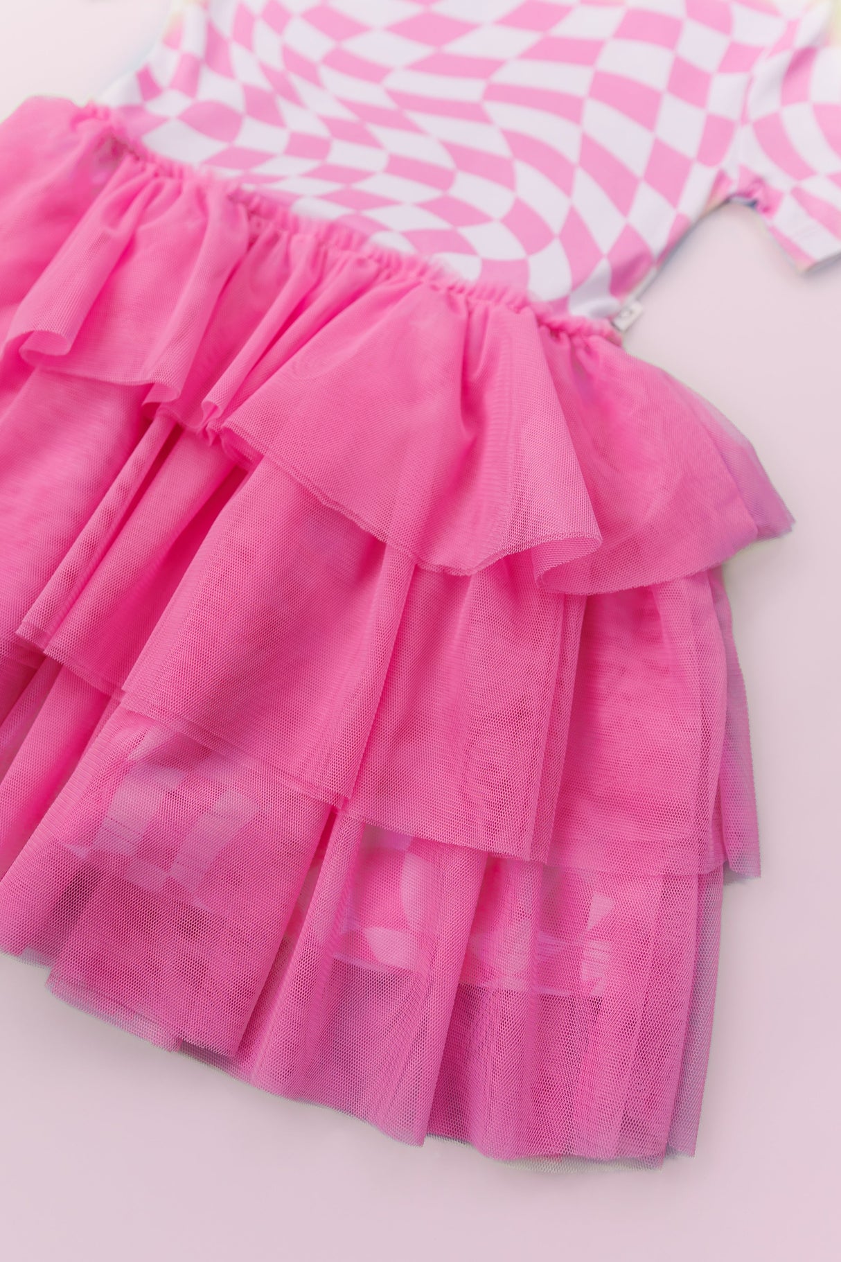 BUBBLEGUM WAVY CHECKERS DREAM TUTU DRESS from DREAM BIG LITTLE CO