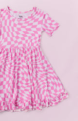 BUBBLEGUM WAVY CHECKERS DREAM RUFFLE DRESS from DREAM BIG LITTLE CO