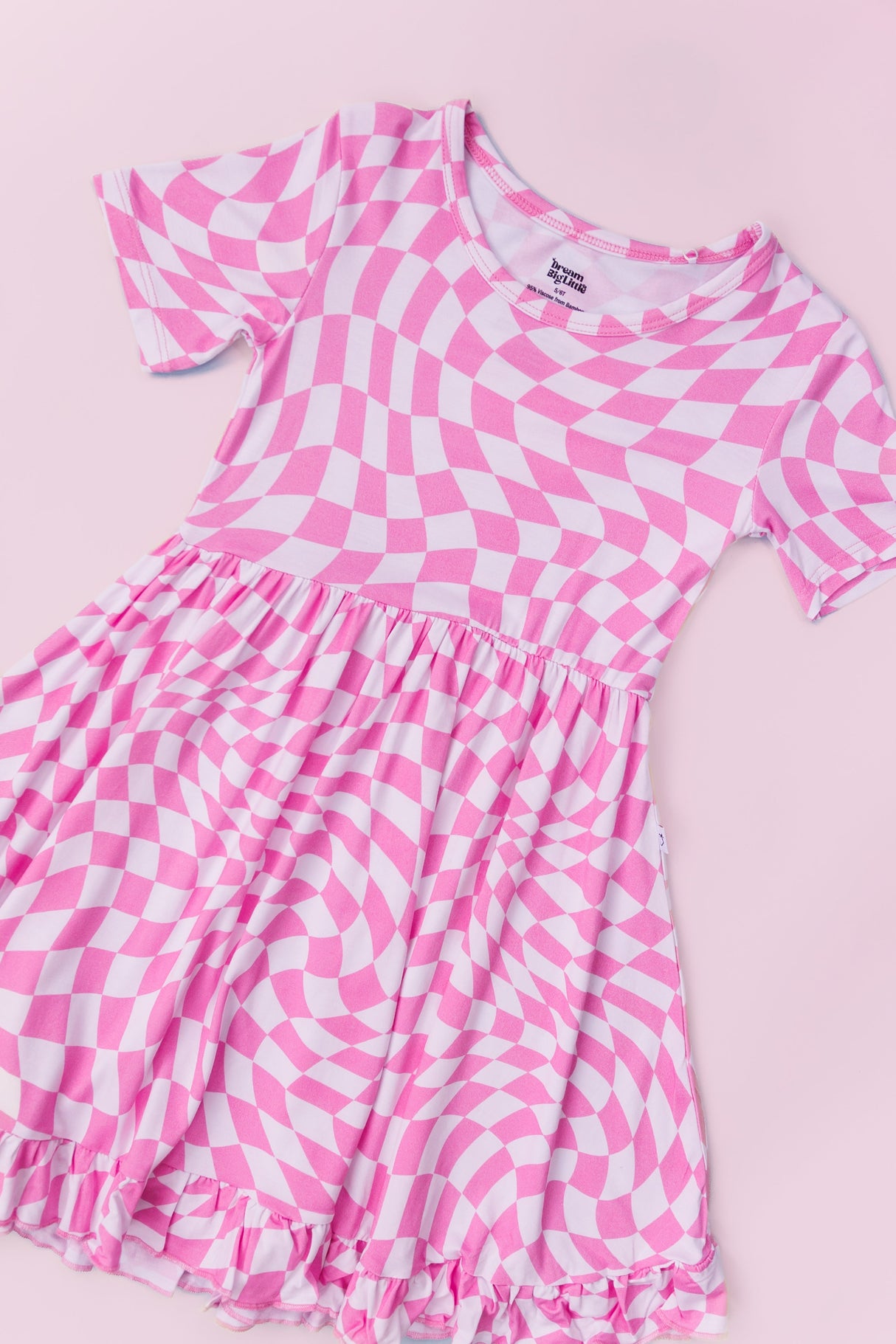BUBBLEGUM WAVY CHECKERS DREAM RUFFLE DRESS from DREAM BIG LITTLE CO