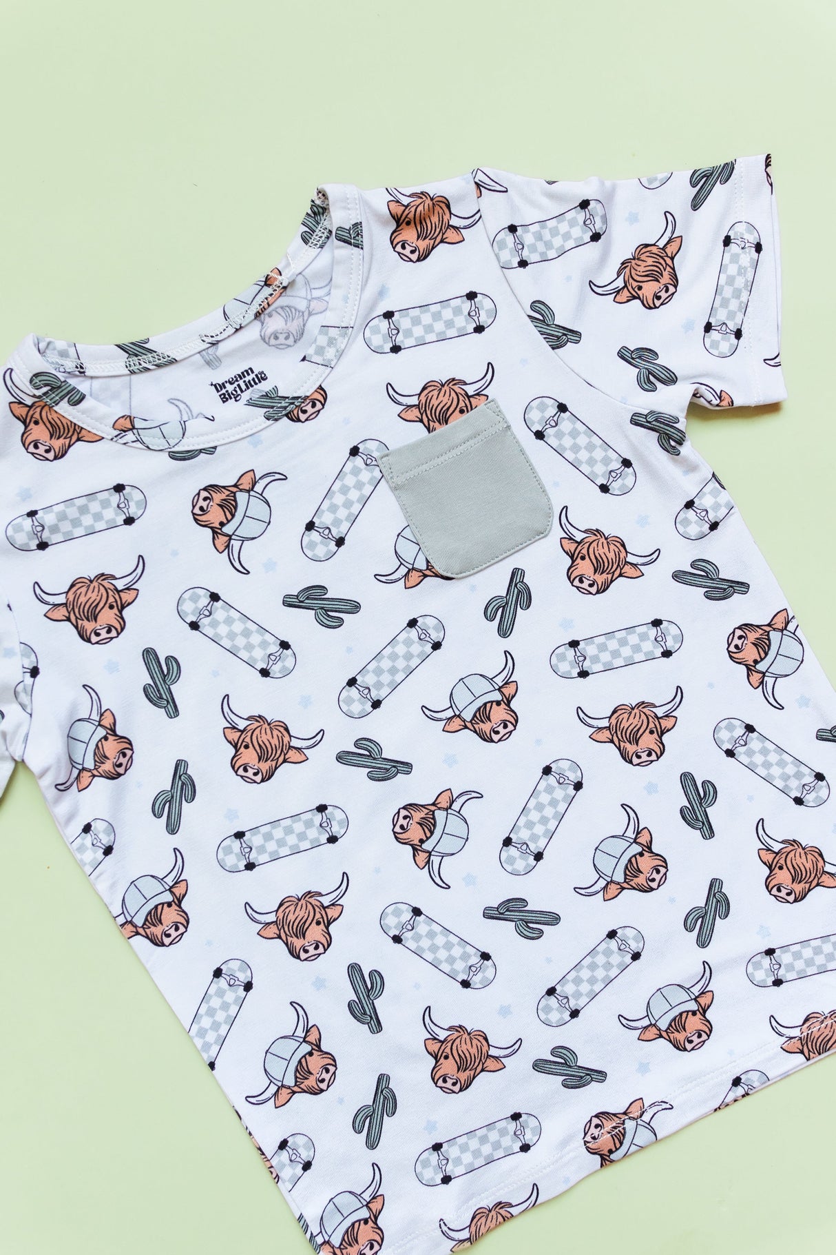 EXCLUSIVE MOO-VING FAST DREAM POCKET TEE from DREAM BIG LITTLE CO