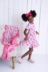 DREAMY PINK CHECKERS DREAM RUFFLE DRESS from DREAM BIG LITTLE CO