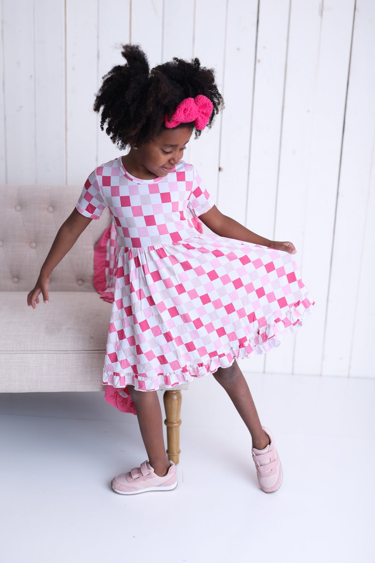 DREAMY PINK CHECKERS DREAM RUFFLE DRESS from DREAM BIG LITTLE CO