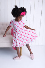 DREAMY PINK CHECKERS DREAM RUFFLE DRESS from DREAM BIG LITTLE CO