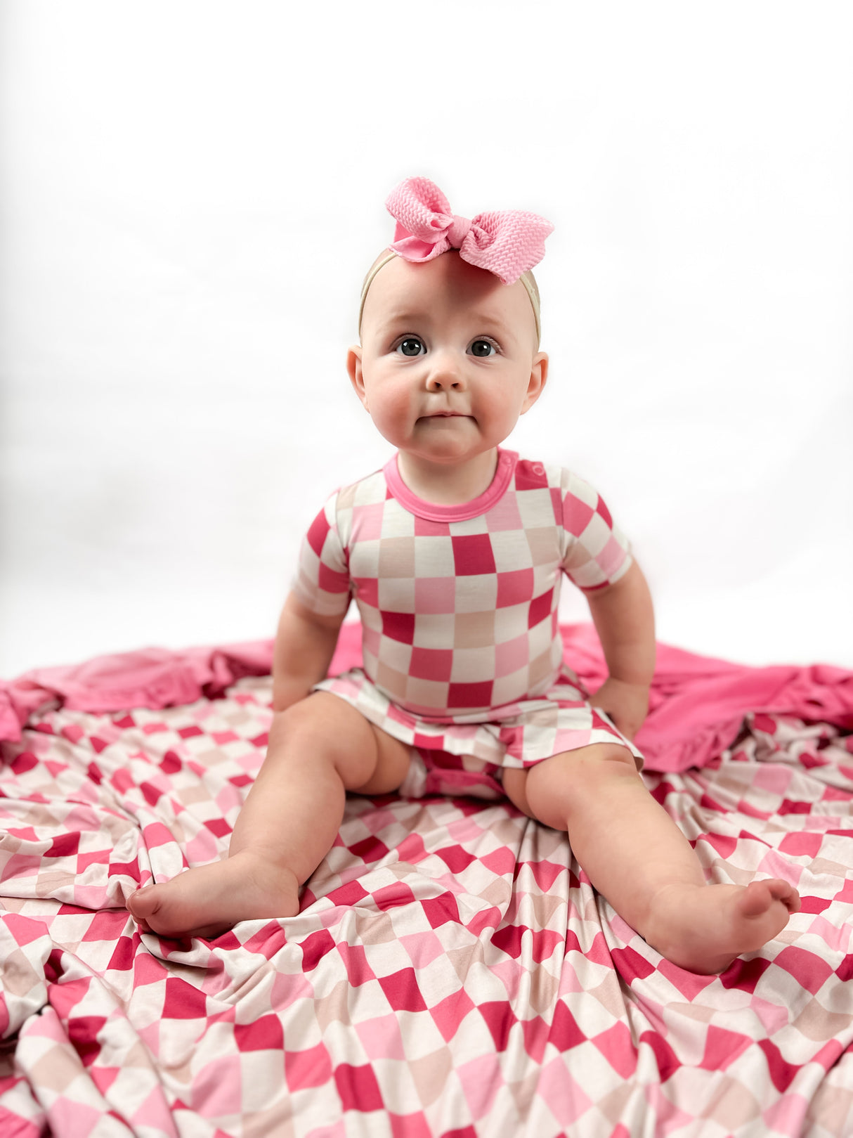 DREAMY PINK CHECKERS DREAM BODYSUIT DRESS from DREAM BIG LITTLE CO