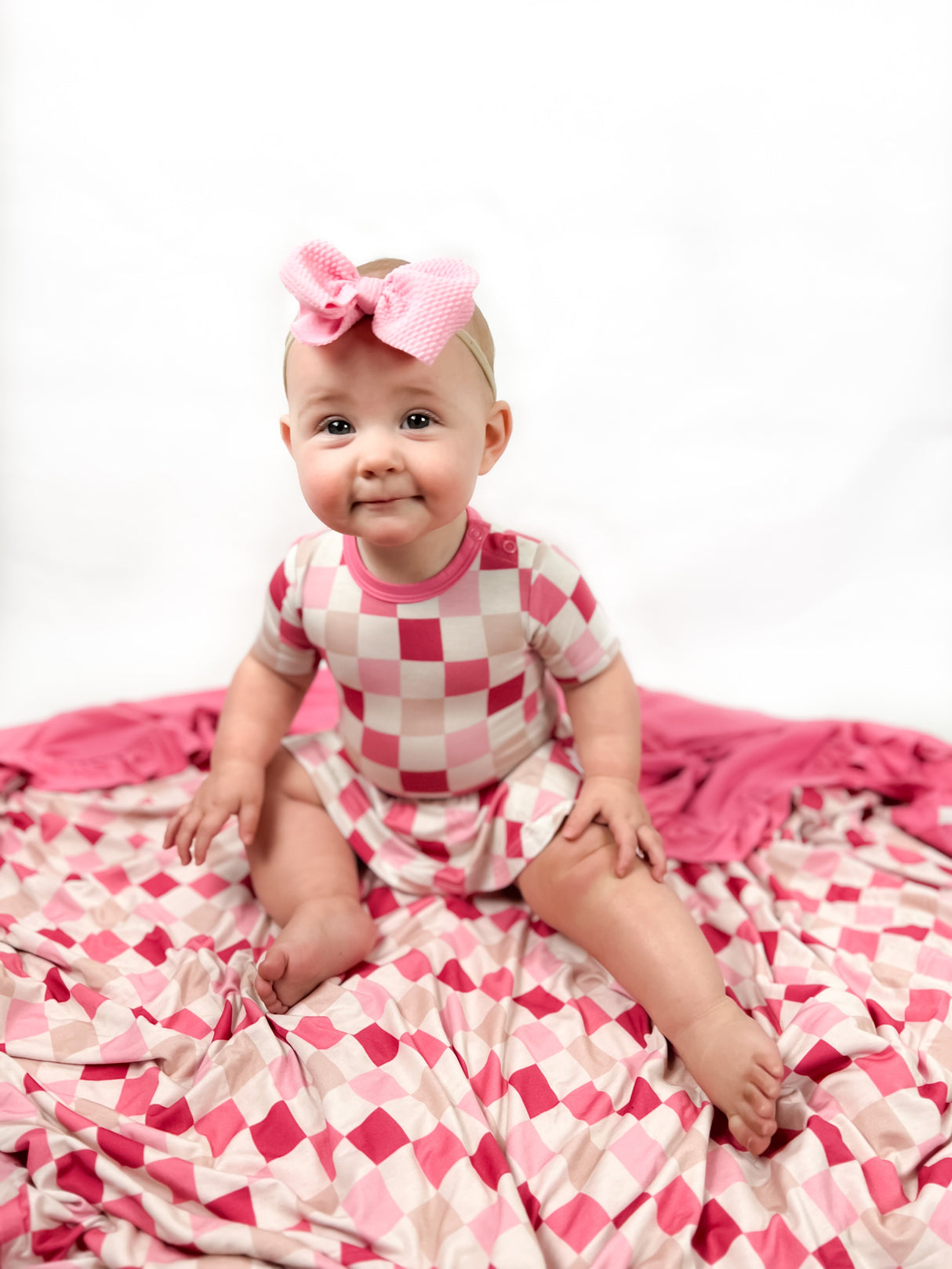 DREAMY PINK CHECKERS DREAM BODYSUIT DRESS from DREAM BIG LITTLE CO
