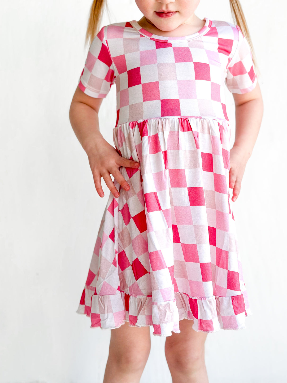 DREAMY PINK CHECKERS DREAM RUFFLE DRESS from DREAM BIG LITTLE CO