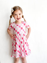 DREAMY PINK CHECKERS DREAM RUFFLE DRESS from DREAM BIG LITTLE CO