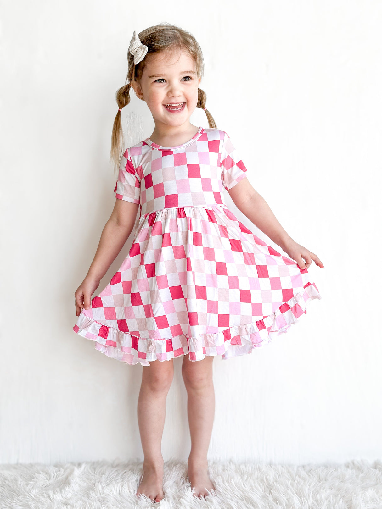 DREAMY PINK CHECKERS DREAM RUFFLE DRESS from DREAM BIG LITTLE CO