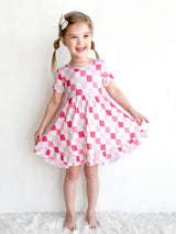 DREAMY PINK CHECKERS DREAM RUFFLE DRESS from DREAM BIG LITTLE CO