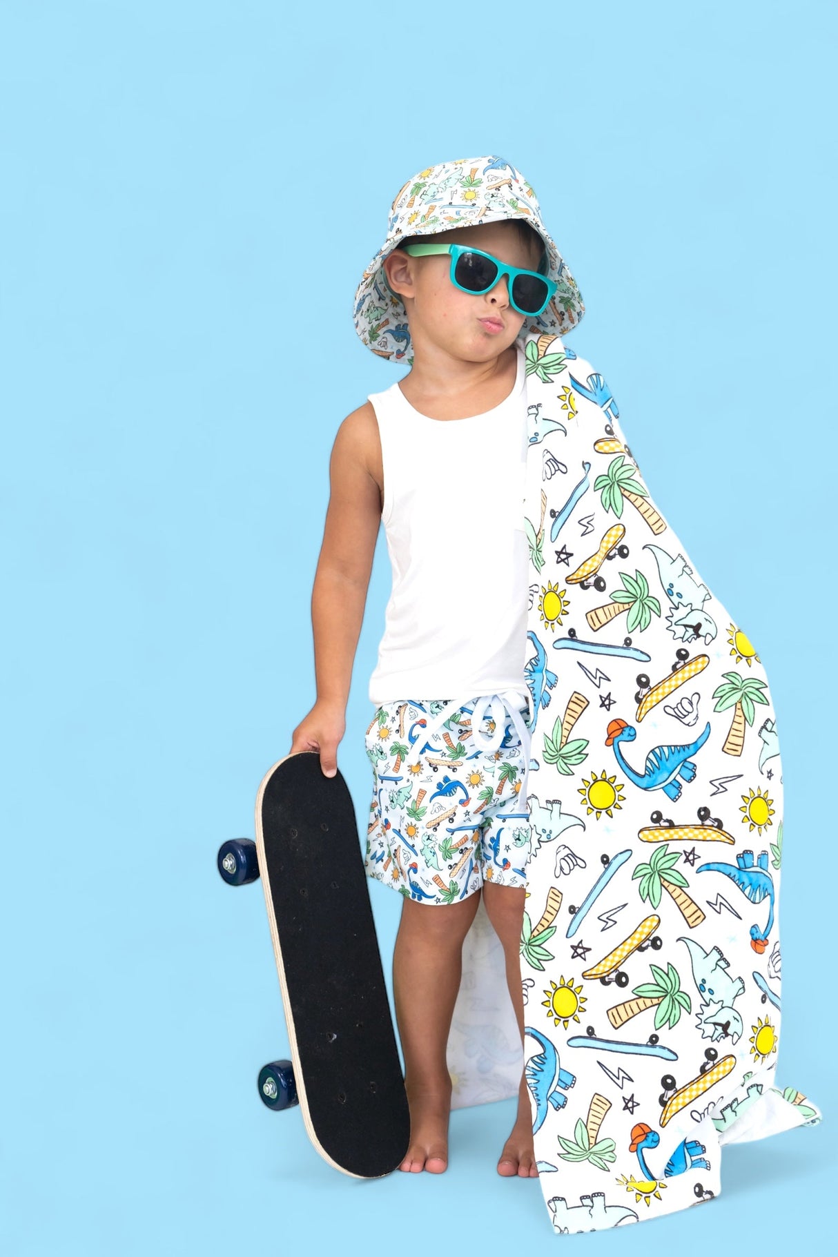 EXCLUSIVE SURF-O-SAURUS DREAM TOWEL from DREAM BIG LITTLE CO