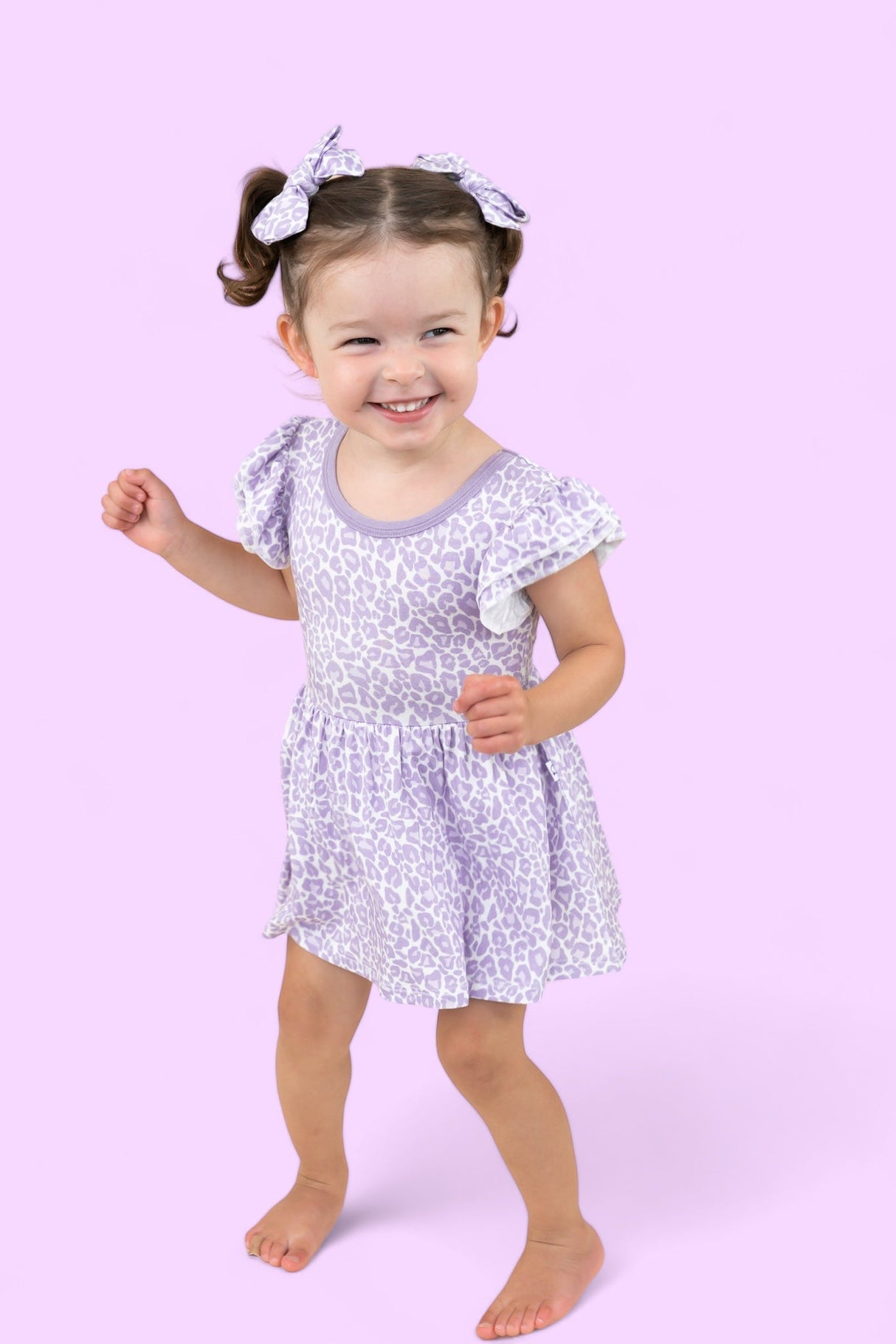 LAVENDER LEOPARD DREAM CAP SLEEVE BODYSUIT DRESS from DREAM BIG LITTLE CO