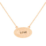"Love" Brass Oval Metal Pendant Necklace from Madeline Love