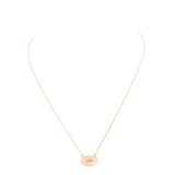"Love" Brass Oval Metal Pendant Necklace from Madeline Love