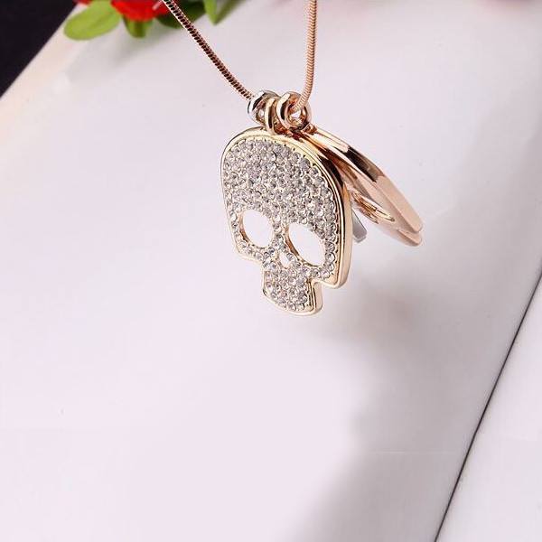 Three Skulls Necklace from Zapps Clothing