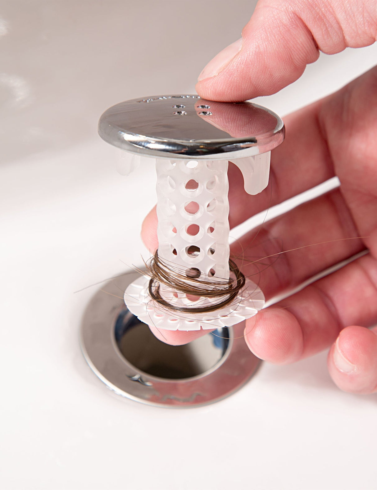 SinkShroom (Chrome Edition) The Hair Catcher That Prevents Clogged Bathroom Sink Drains from TubShroom.com
