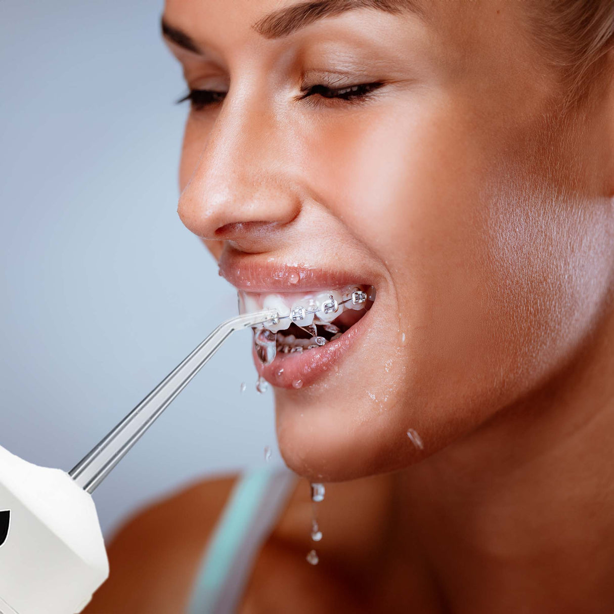 Portable USB Rechargeable Collapsible Water Flosser from Pursonic