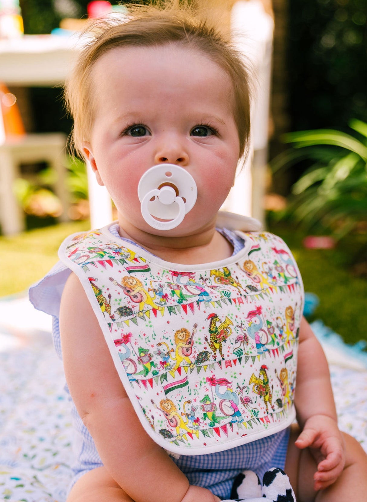 Musical Jubilee Bib in White from Timo & Violet