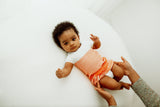 Orange Arms Out™ Short Sleeve Sleep Sack From Swaddelini