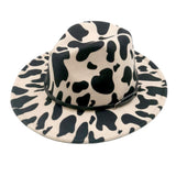 Faux Leather Band Cattle Patterned Panama Hat from Madeline Love