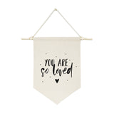 You Are So Loved Hanging Wall Banner from The Cotton & Canvas Co.