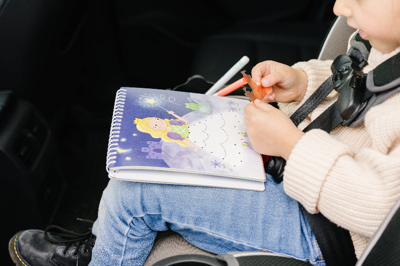 Small 7" Dry Erase Activity Book (incl. 2 Washable Markers & Reusable Stickers) from UnbuckleMe®