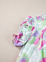 Abstract Green Bubble Sleeve Smocked Blouse with Unique Print from MsDressly