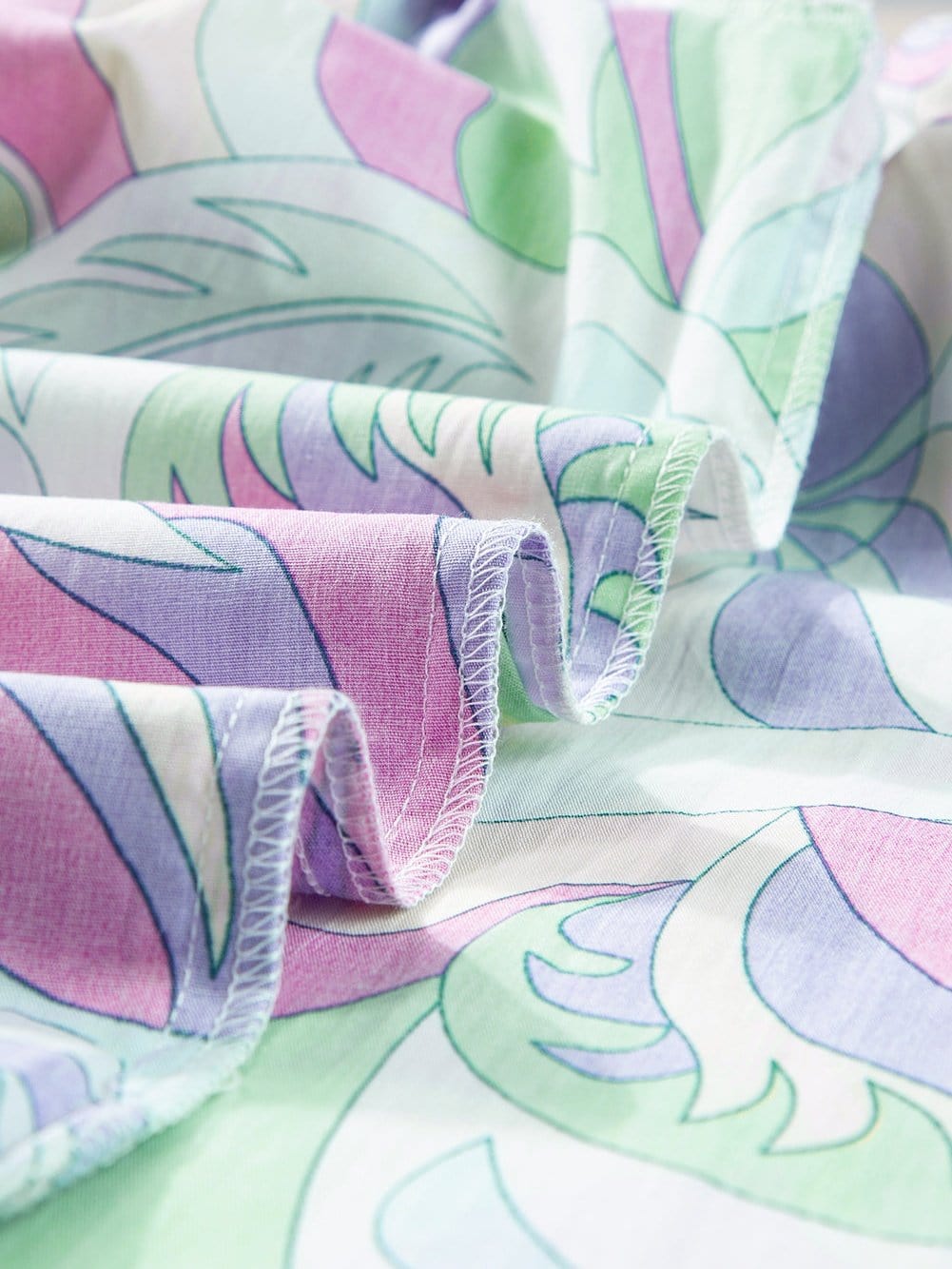 Abstract Green Bubble Sleeve Smocked Blouse with Unique Print from MsDressly