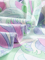 Abstract Green Bubble Sleeve Smocked Blouse with Unique Print from MsDressly