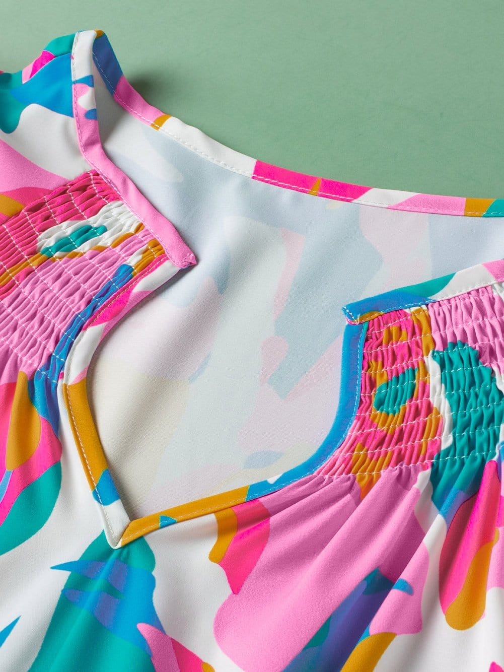 Abstract Print Notched Neck Flutter Sleeve Blouse with Multicolour Vibrancy from MsDressly