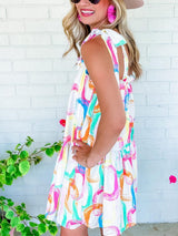 Abstract White Ruffled Mini Dress with Knotted Straps from MsDressly