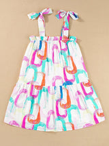 Abstract White Ruffled Mini Dress with Knotted Straps from MsDressly