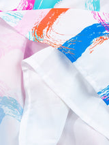Abstract White Ruffled Mini Dress with Knotted Straps from MsDressly
