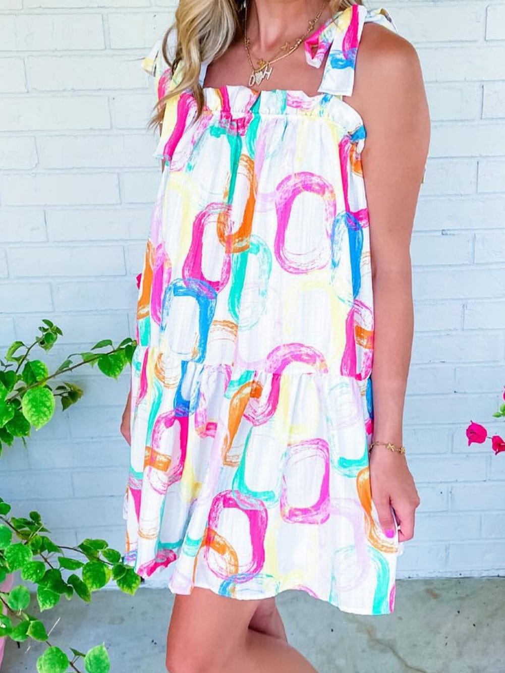 Abstract White Ruffled Mini Dress with Knotted Straps from MsDressly
