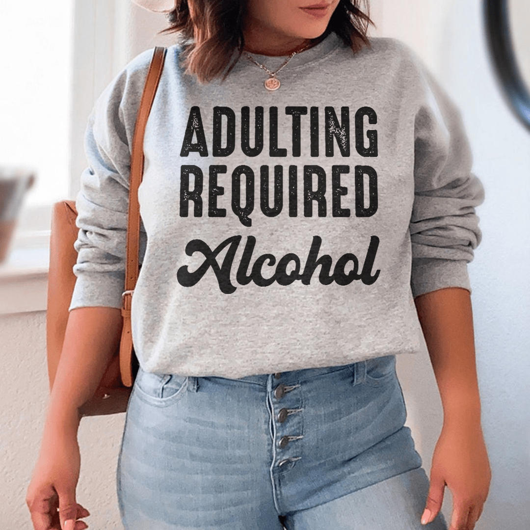 Adulting Requires Alcohol Sweatshirt From Peachy Sunday