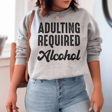 Adulting Requires Alcohol Sweatshirt From Peachy Sunday