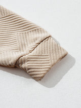 Apricot Textured High Neck Sweatshirt with Unique Asymmetrical Buttons from MsDressly