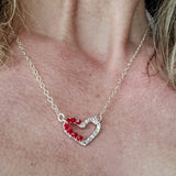 Silver Red Crystal Hammered Heart Necklace from Alexa Martha Designs
