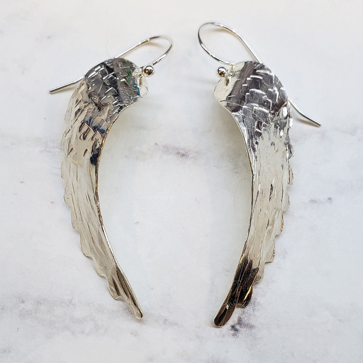 Sterling Silver Hammer Pattern Sculpted Angel Wing Earrings from Alexa Martha Designs