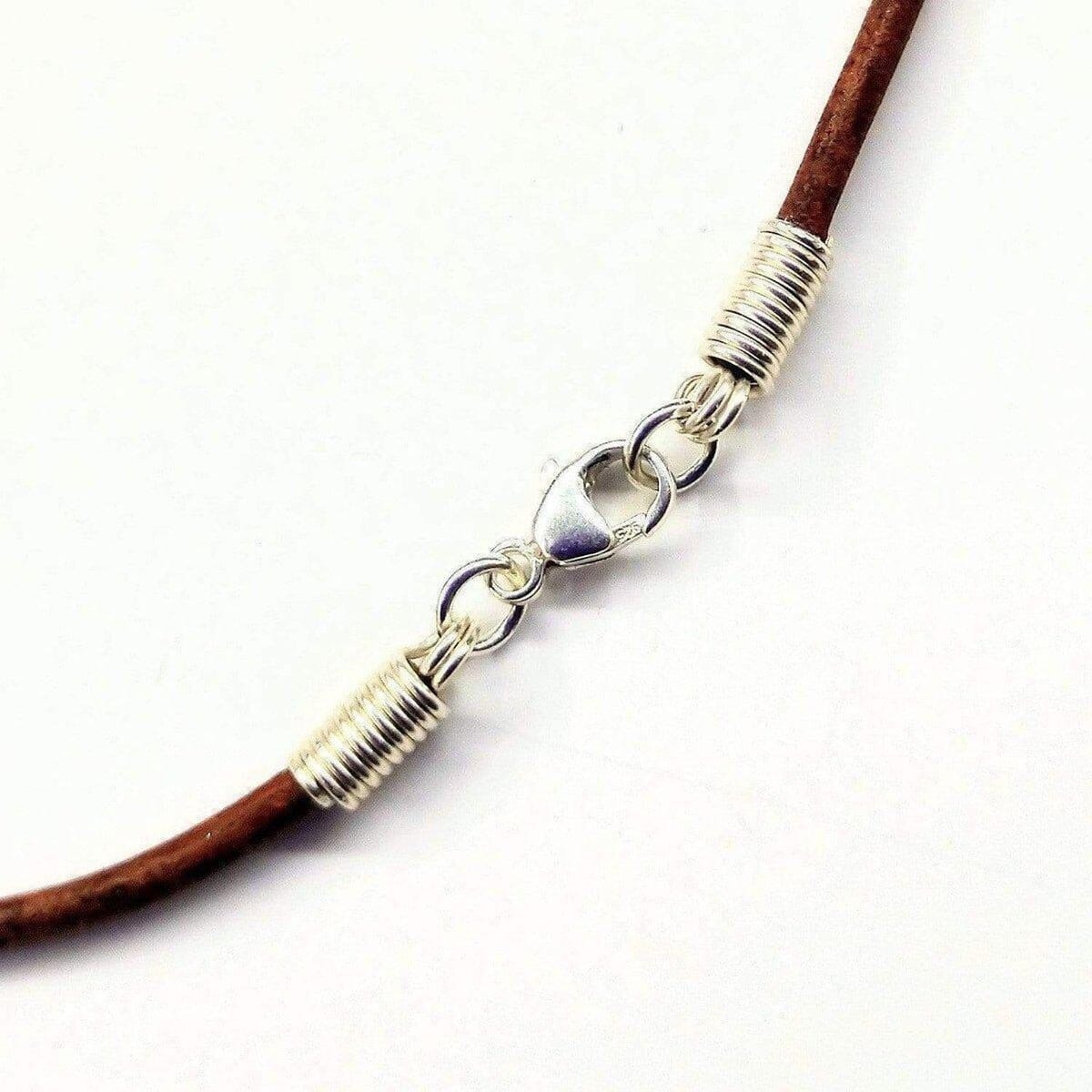 Silver Wrapped Purple Dyed Crackle Agate Point Leather Necklace from Alexa Martha Designs